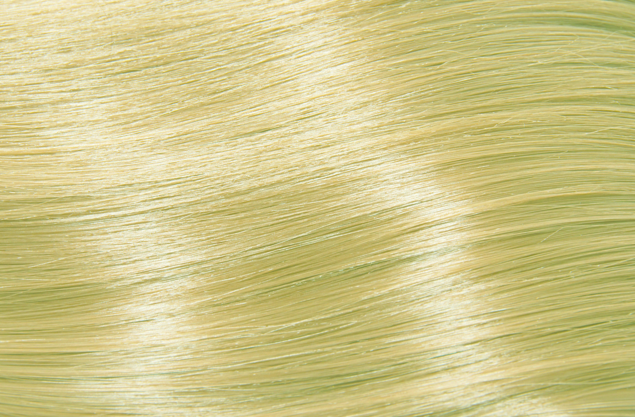 картинка 10/0 Крем-краска перманентная UNIQUE яркий блондин 100 мл